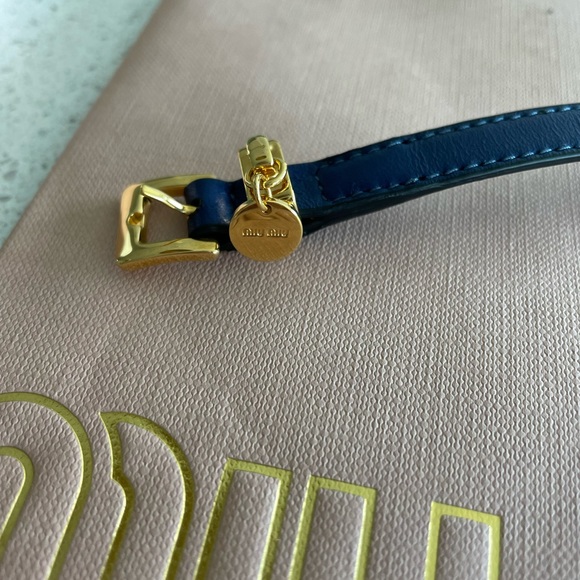 Brand new AUTHENTIC Miu Miu Prada leather bracelet in navy with gold hardware. - Picture 3 of 6